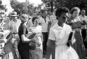 Elizabeth Eckford, one of the Little Rock Nine, harassed by crowd.